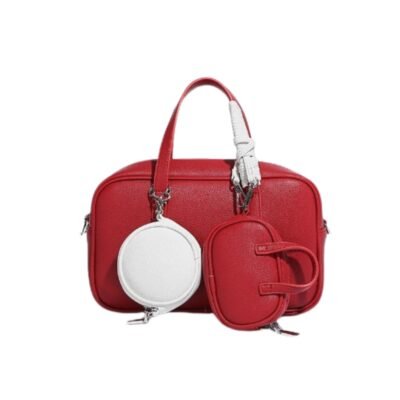 Red color leather bag